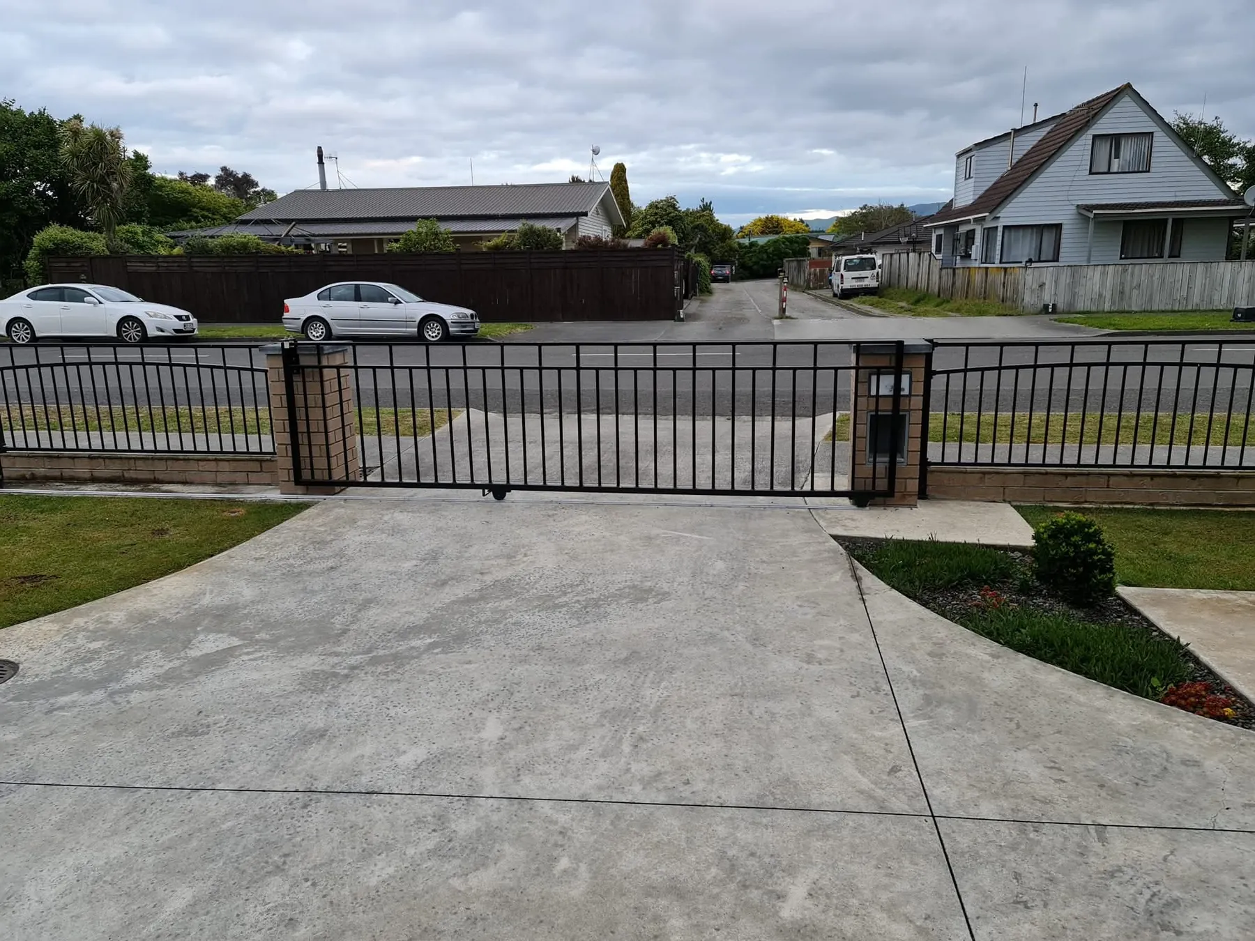 Powder-coated driveway gate and fence